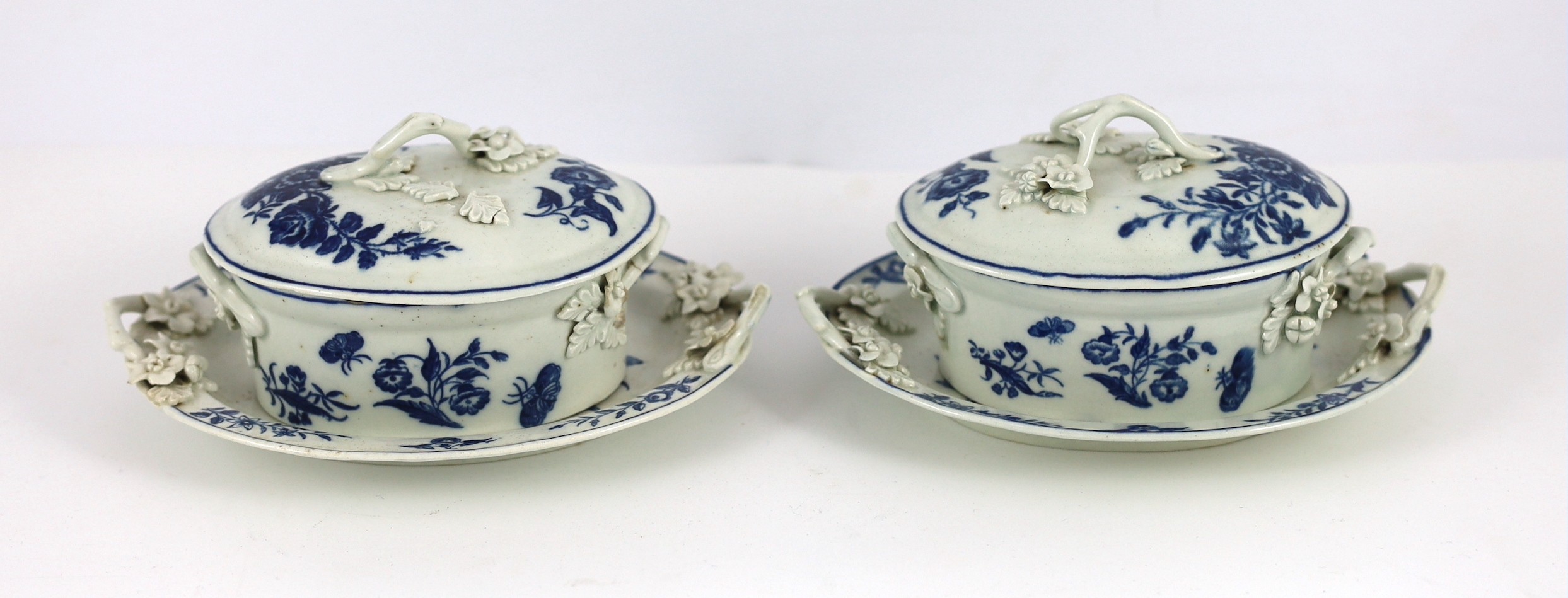 A pair of Caughley blue and white butter tubs, covers and stands, c.1780, stands 19cms wide, tubs and covers 9cms high